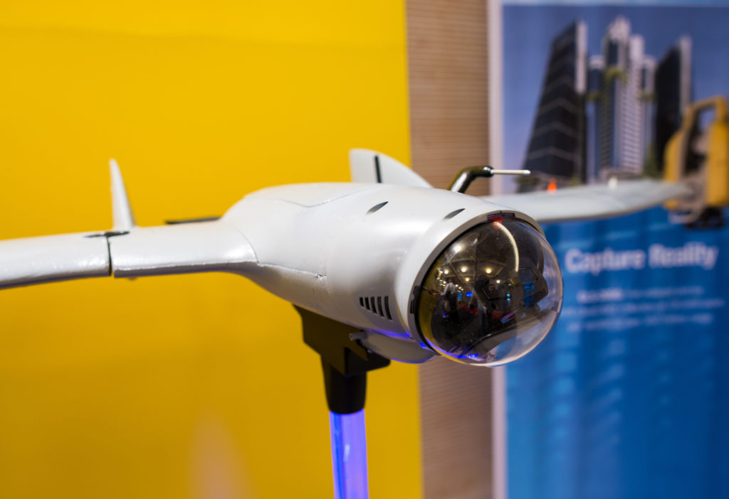 The image shows a close up of a surveillance drone, displaying the classification of drones.